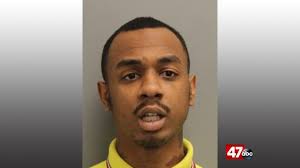 Two men facing drug and weapon charges following traffic stop