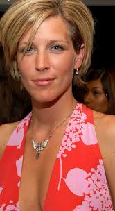 Carly looks attractive in dark hair