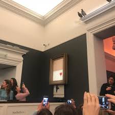 Banksy just delivered a masterclass in using technology to both create and comment on art. Banksy Painting Spontaneously Shreds Itself Moments After Selling For 1 4 Million At Sotheby S Colossal