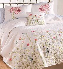 Reversible bedspreads are available in several floral patterns, with a different colour background on either side. Plowhearth