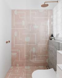 Design ideas for a contemporary bathroom in sydney with white cabinets, a curbless shower, black tile, green tile, pink tile, white tile, mosaic tile, white walls, an undermount sink, black floor, an open shower and white benchtops. Love The Pop Of Blush In This Bathroom By Decus Interiors Bathroom Abiinteriors Abi Bathroom Interior Pink Bathroom Tiles Bathroom Interior Design