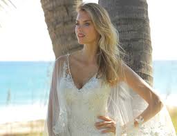 For brides insecure about their arms, the overlay top on this dress is a lovely addition to all over beading makes an ivory or cream wedding dress every bit as special as a traditional white wedding dress. Beautiful Wedding Dresses For Older Brides Confetti