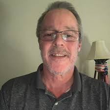 What is the movie with a mostly black cast, a refined older man as the head  of a Mafia-style gang, who says he doesn't want to miss his stories?