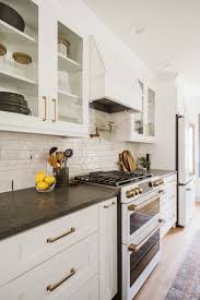 Should I Paint My Kitchen Cabinets Pros Vs Cons In 2020 Kitchen Cabinets White Cabinets Black Countertops Shaker Kitchen Cabinets