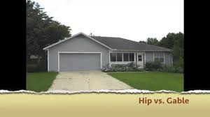 It is usually constructed with two large sloping roof sections in the front and back respectively, while each of the two sides is usually constructed with a smaller roof section. What Is The Difference Between A Hip And A Gable Roof Youtube