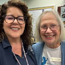 On rainy days like these, we are especially grateful for the new Welcome  Pavilion built by Adam Hellinga, Scout Troop 350 in Arlington, as his Eagle  Scout project. This pavilion provides shelter