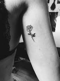 Simple Small Black Rose Tattoo On The Left Upper Arm Black Rose Tattoos Small Black Tattoos Gardenia Tattoo