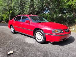 Image result for Victory Red 2004 Impala