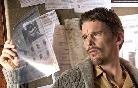 Sinister Movie Review Film Summary 2012 Roger Ebert Ethan hawke juliet rylance vincent d'onofrio james ransone opening with an 8mm footage of a family being killed by an unseen figure, sinister concerns a.