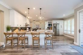 Dark wood floors warm up the space in this luxury kitchen. Best Flooring For Kitchens In 2021 The Good Guys