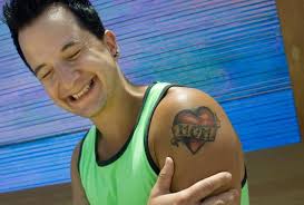 Tattoos at the U.S. Open of Surfing: Beachgoers explain what their body art  represents