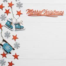 White background with a happy santa claus holding christmas gifts: Free Photo Christmas Background With Space And Letters