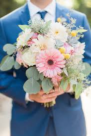Groom Holding The Bride S Bouquet With Succulents Gerbera Daisies Dahlias Seeded Eucalyptus Daisy Bouquet Wedding Gerbera Daisy Wedding Homecoming Flowers