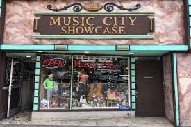 From chet atkins to miley cyrus, many music stars were born or made famous in nashville; Music City Showcase Downtown Nashville