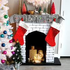 I'm sharing all one project i knew i wanted to complete this year was a faux fireplace mantel for our christmas. How To Make A Cardboard Holiday Fireplace Hgtv