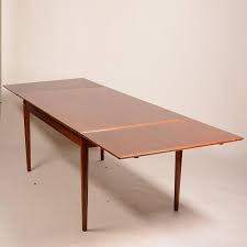Need a little help putting the room together? Large Danish Modern Draw Leaf Dining Table In Teak For Sale At 1stdibs
