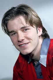 David beckham of manchester united chips the ball forward during the fa barclaycard premiership match between manchester united and leeds united held on march 5, 2003 at old trafford. Evolution Of David Beckham S Hotness Photos Of David Beckham Through The Years