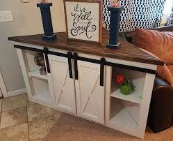 Corner Tv Console With Sliding Barn Doors All Ready For Delivery Yonderwaywoodshop Modified From Farm House Living Room Corner Tv Console Farmhouse Tv Stand