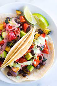 Roasted Veggie Tacos With Creamy Cilantro Sauce Recipe Veggie Tacos Recipes Veggie Tacos Vegetarian Tacos Recipes