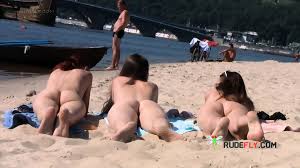 Meyzi Black at the nude beach - her friend joins the torrent fun