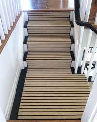 Striped Carpet Runner Moves From Horizontal To Vertical Round Carpet Living Room Stair Runner Carpet Carpet Stairs