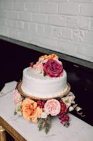 Make This Chic Grocery Store Cake Hack For Your Next Party Ruffled Diy Wedding Cake Fresh Flower Cake Wedding Cake Rustic
