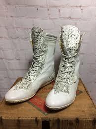I'd add cash if you were only interested in one. 1980s Lace Up Leather Moon Boots With Metallic Croc Detailing Boardwalk Vintage