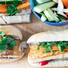 Fresh fillings and garnishes — like do chua (pickled daikon and carrot), cucumber, cilantro, and hot peppers — may be adjusted to your liking. Vegan Tofu Banh Mi Cook Veggielicious