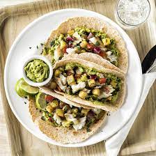 We have served our fish taco's with guacamole for an authentic mexican. Guacamole And Grilled Fish Tacos With Pineapple Salsa Recipe Simplot Foods