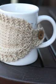 Mug cozy (single/double crochet) pattern by kathryn mason. Homebody Buttoned Mug Cozy Knitting Pattern Plain And Cabled Knit Coffee Cozy Pattern Coffee Cozy Pattern Crochet Mug Cozy