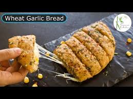 326 No Oven No Maida Cheesy Garlic Bread Recipe Wheat Garlic Bread Without Oven The Terrace Kitchen Garlic Bread Recipe Cheesy Garlic Bread Garlic Bread