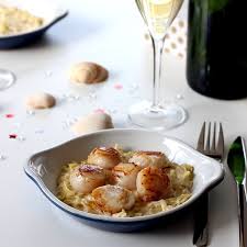 Recette De Saint Jacques Au Champagne Sur Fondue De Poireau Recette Recettes De Cuisine Recette Saint Jacques