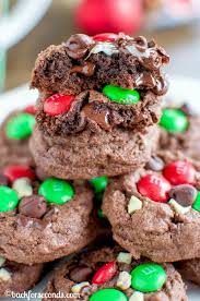 The black cocoa powder makes the cookies so delicious, rich in flavour and color. These Soft Thick And Chewy Chocolate Peppermint M And M Cookies Are The Perfect Easy Ultimate Christmas Dessert Cookies Recipes Christmas Christmas Desserts
