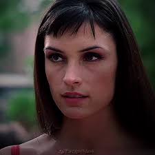 Famke Janssen in The Faculty as Miss Elizabeth Burke 🫦🤭