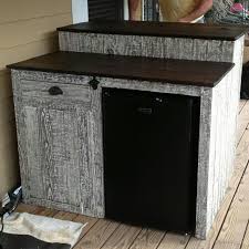 Custom Outdoor Bar With Mini Fridge Storage Cabinet And Drawer Finished In Driftwood Outdoor Mini Fridge Diy Outdoor Bar Outdoor Storage Cabinet