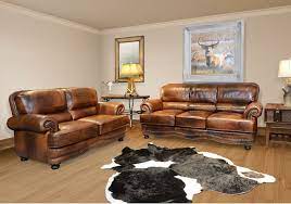 Living room and family room furniture. Lacks Cowboy 2 Pc Top Grain Leather Living Room Set