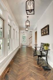 I Like The Colour Of This Floor Not The Pattern Goes Well With Dark Wood Furniture And White Walls Trans Floor Design Herringbone Wood Floor Home Decor