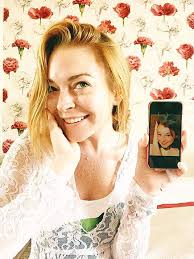 Lindsay Lohan Still Looks Like Her Parent Trap Days