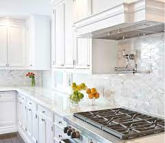 Because acid etching leaves a whitish. White Kitchen Cabinets With Oblong Marble Tiles Kitchen Backsplash Tile Designs White Marble Kitchen Kitchen Marble