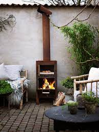 If you're using the flame for cooking food, wood is ok. Pin Pa Outdoor Spaces Gardens