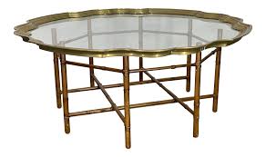 A contemporary console table, with a rectangular glass top and a bamboo base. Faux Bamboo Coffee Table With Brass And Glass Top