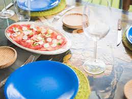 One of this year's top decorating trends is the greek or mediterranean look. How To Host A Modern Greek Dinner Party