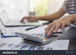 Business Woman Thinking Account Calculator Laptop Business Chart And Graph Document On Desk Royalty Free Image Business Women Charts And Graphs Accounting