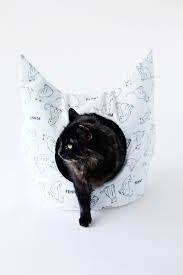 Follow the pattern templates to cut out two side pieces, two ears, one bottom piece, and one tail from the felt. Free Cat Bed Sewing Pattern See Kate Sew