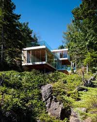 Dogs on edge of sea cliff. Modern Cabin In The Woods Gambier Island House Digsdigs