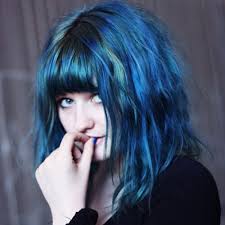 Curl your bangs by wrapping their ends just once around the curling iron. Blue Bangs Hairstyle Tautan O