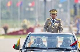 Burmese military veteran in uniform selling books on the. Mzn4udr4ddejzm
