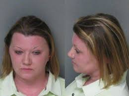 Woman charged after running moped off road