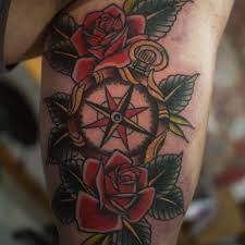 These tattoos have a basic design of the four cardinal directions surrounded by roses. 125 Directional Compass Tattoo Ideas With Meanings Wild Tattoo Art