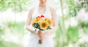 So if you like flowers and want your wedding theme to be bright and colorful, then why not choose sunflowers? Sunflower And Red Rose Bridal Bouquet
